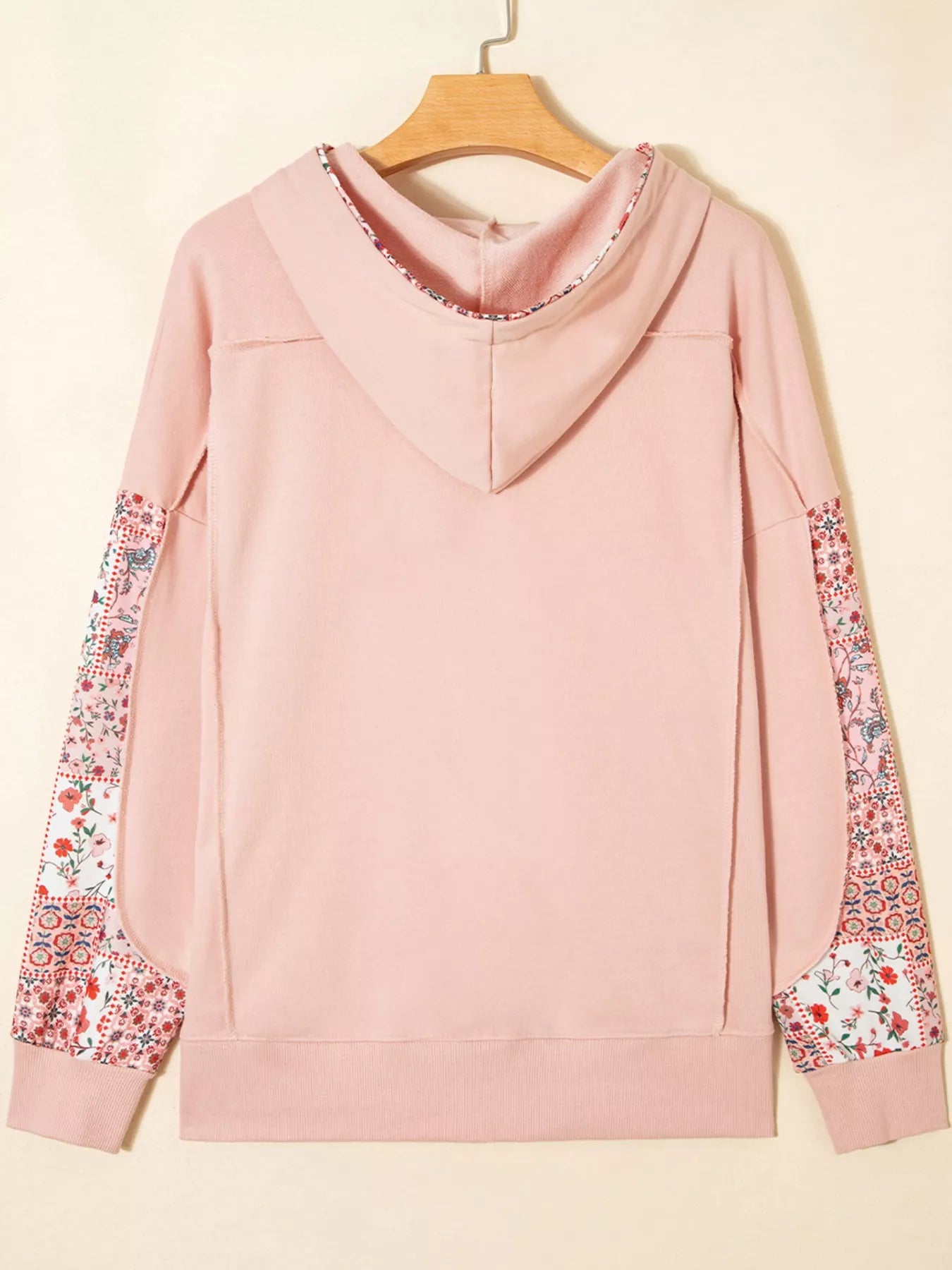Blossom Path Hoodie in dusty pink with floral patchwork details and drawstring hood