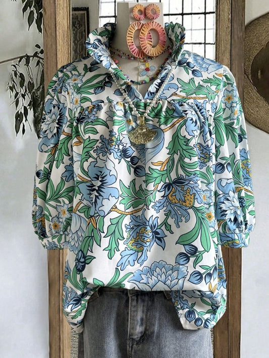 White blouse with blue green floral botanical print and gathered neckline