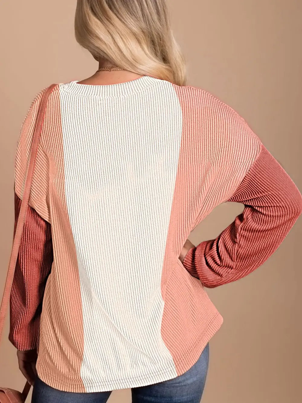 Boutique colorblock ribbed knit long sleeve top with relaxed fit