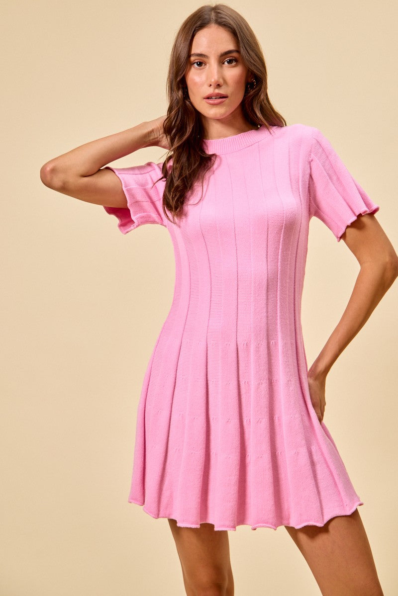Pink ribbed sweater knit mini dress with short sleeves and flared silhouette