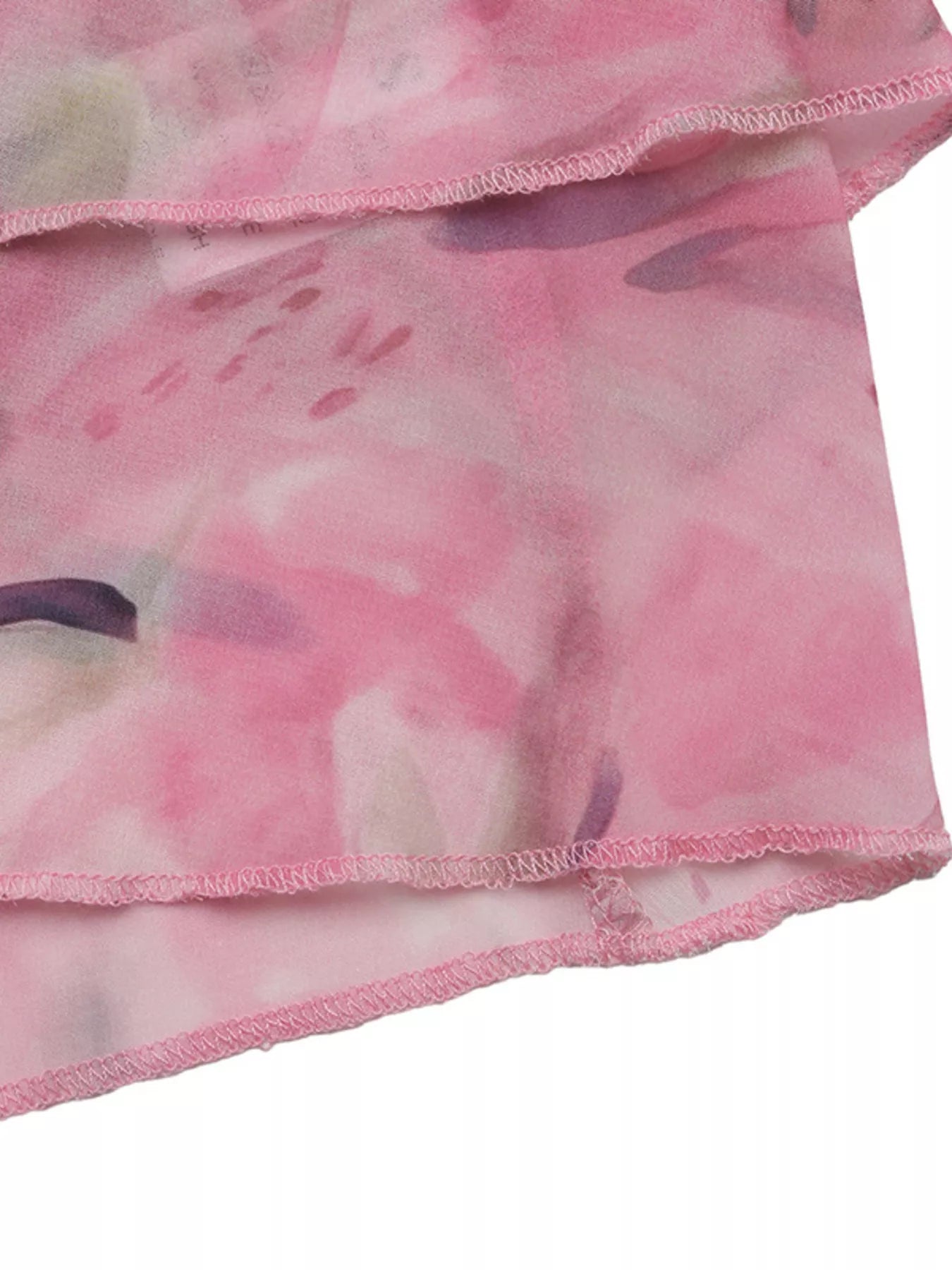 pink floral halter top with layered flowy design and soft feminine style