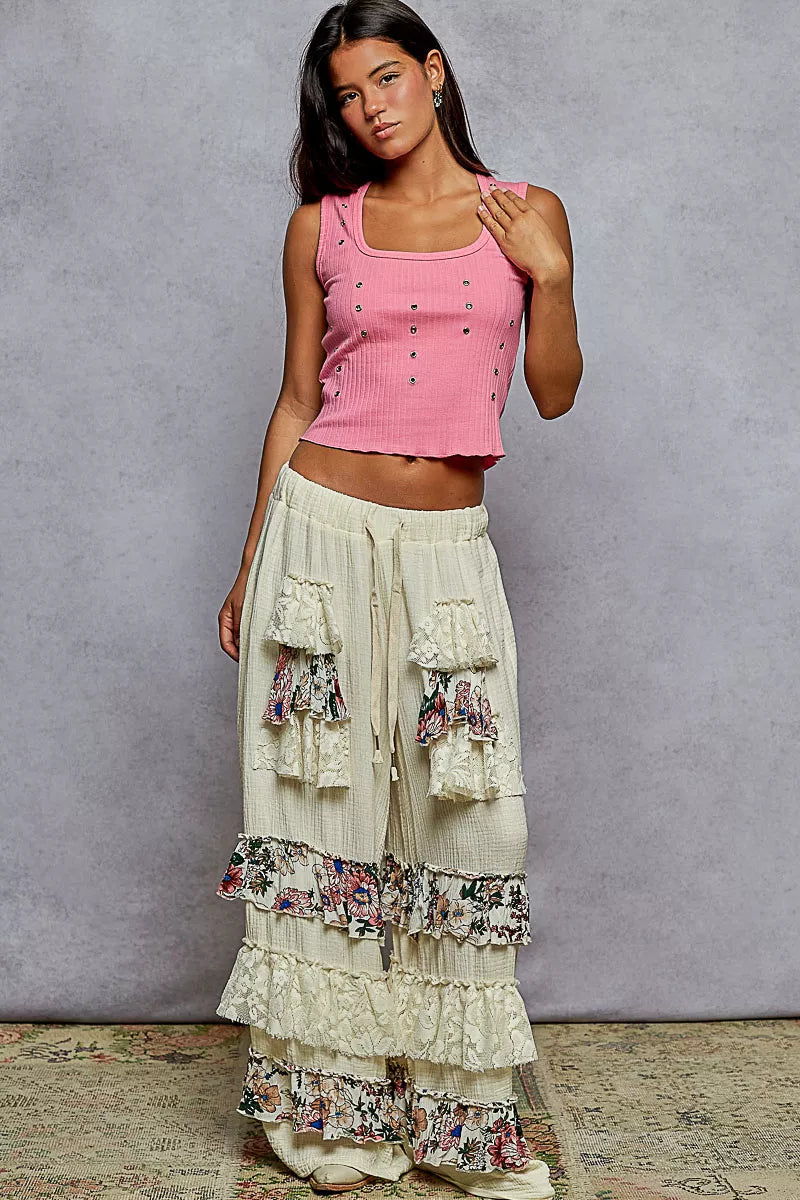 Wide-leg cotton pants with lace and floral tiered ruffles, drawstring waistband, and bohemian style