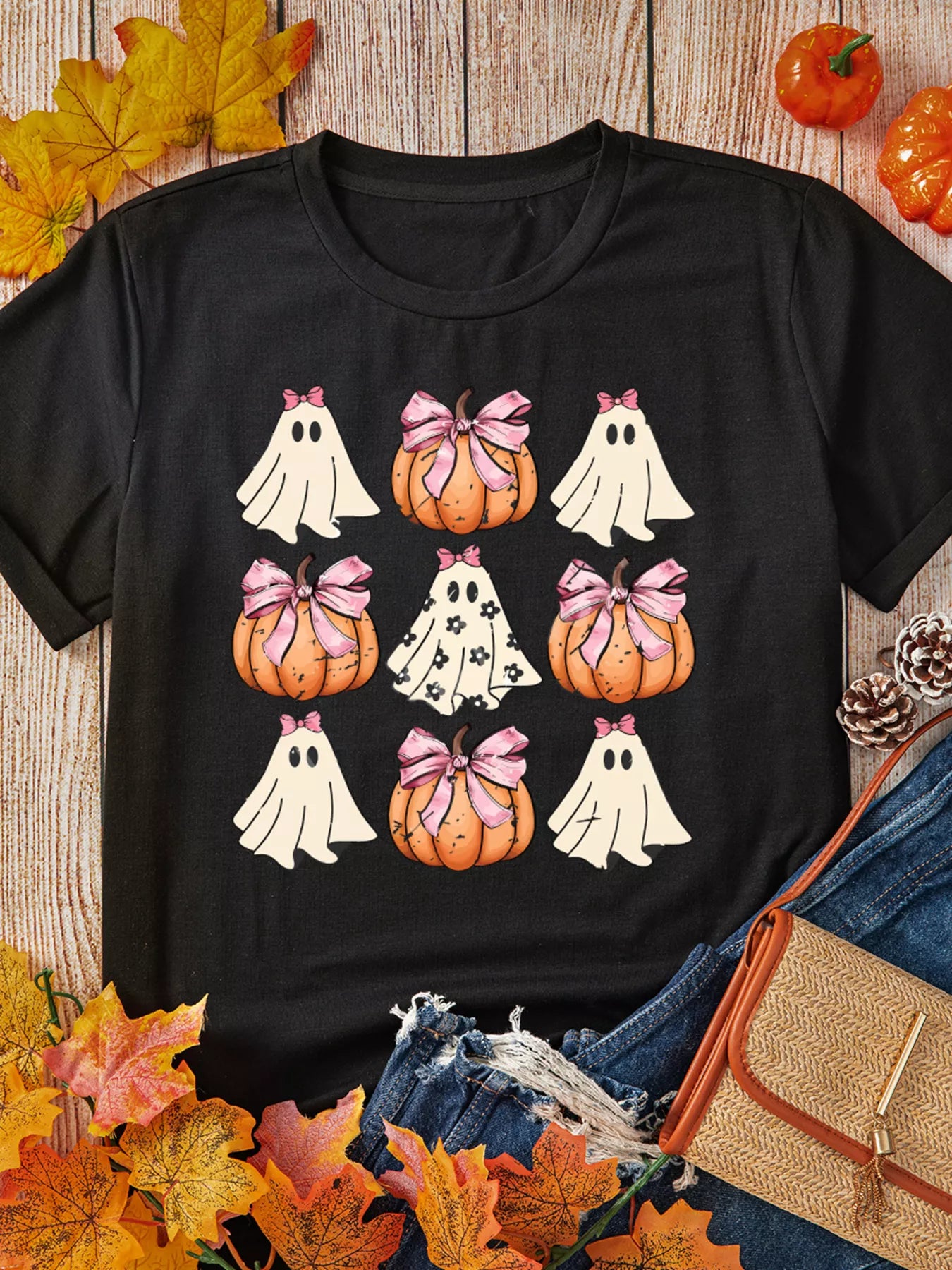 Black Halloween tee with ghosts and pumpkins wearing pink bows – Boo Crew Bowknot style from A Whimsical Affair.