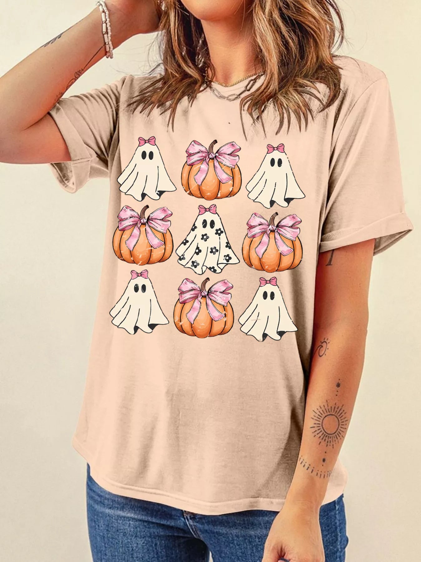 Tan Halloween tee with ghosts and pumpkins wearing pink bows – Boo Crew Bowknot style from A Whimsical Affair.