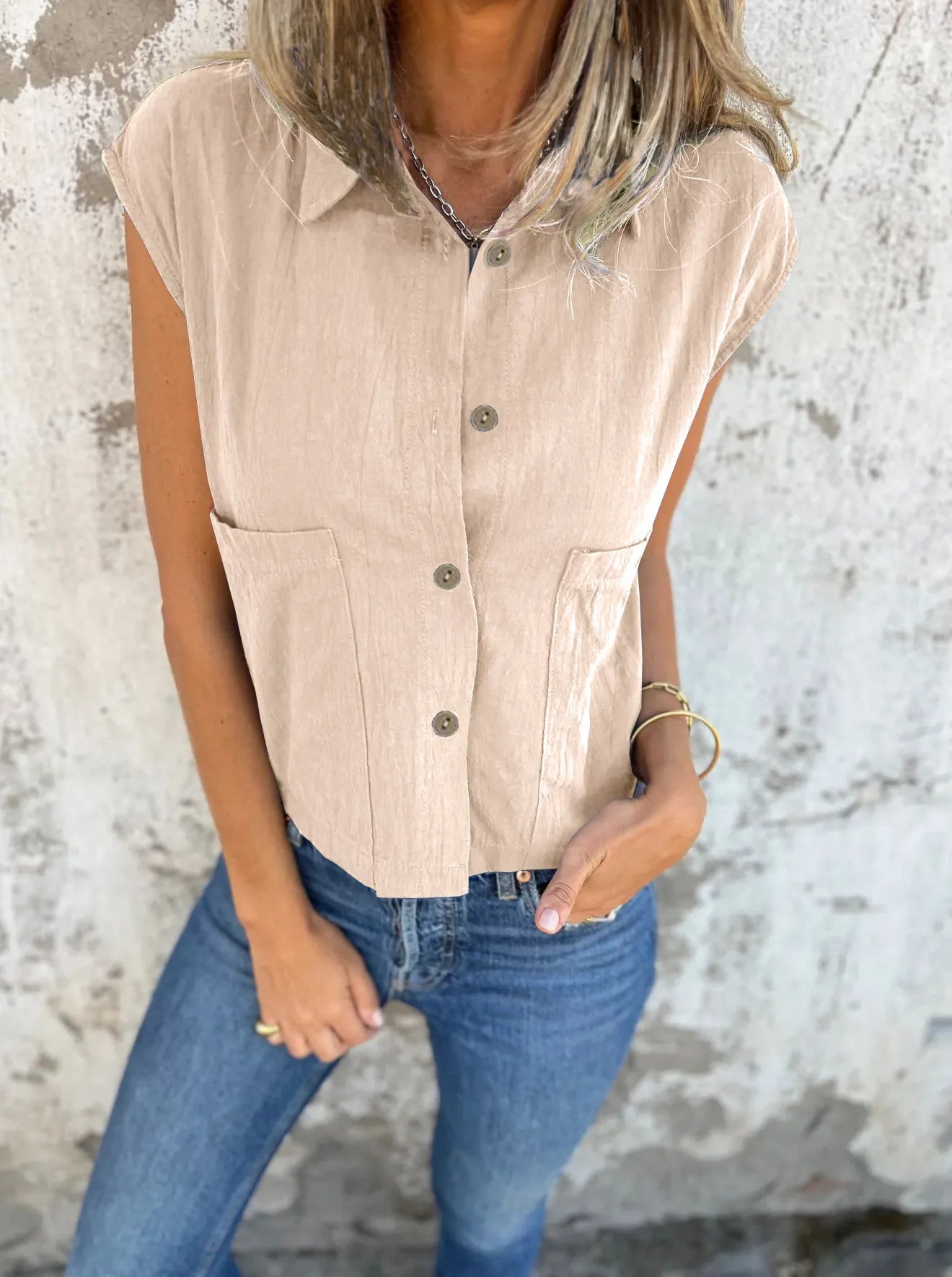 Breezy Linen Cap Sleeve Shirt in apricot with button-down front, cap sleeves, and pockets.