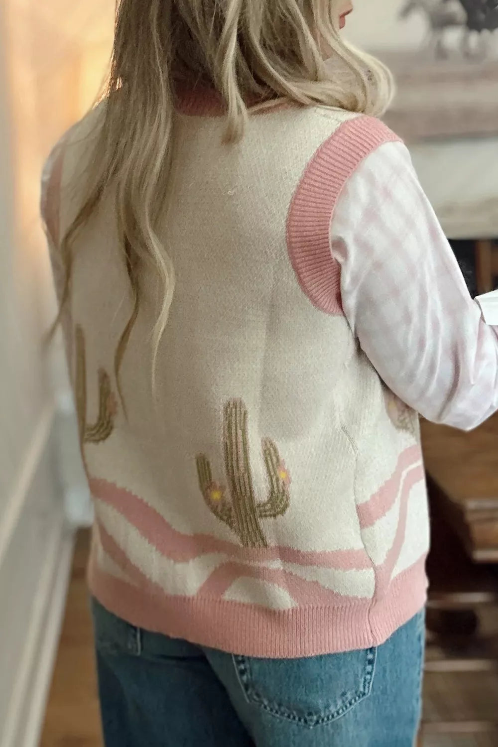 Sleeveless button-front knit vest with cactus designs, pink trim, soft stretch fabric, and desert-inspired boho style.