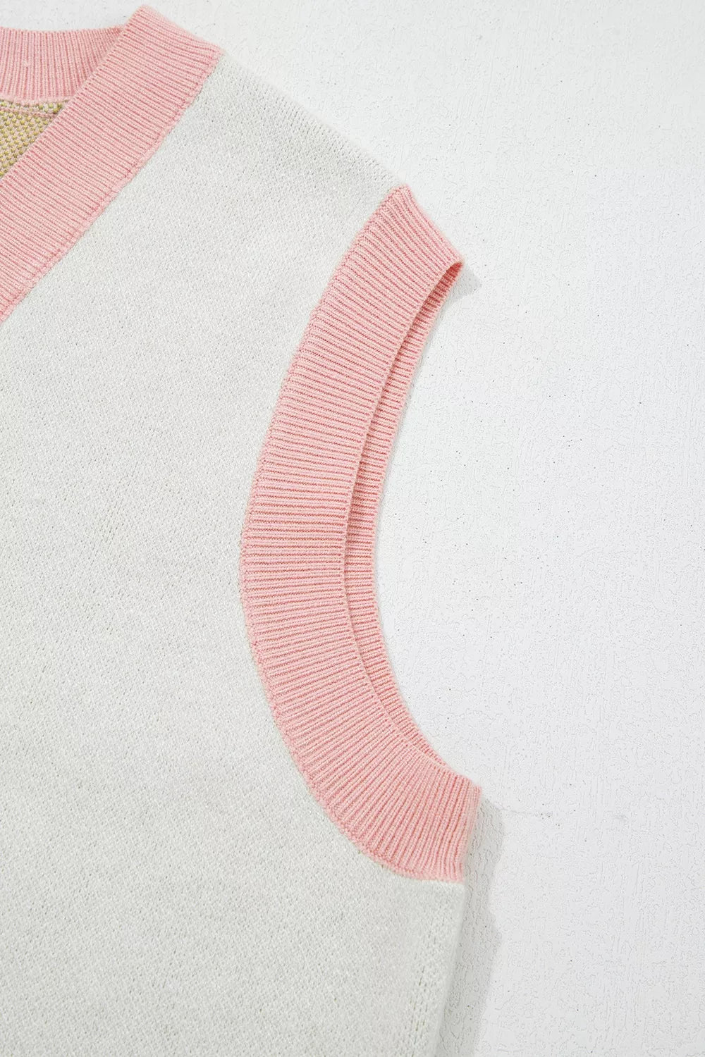 Sleeveless button-front knit vest with cactus designs, pink trim, soft stretch fabric, and desert-inspired boho style.