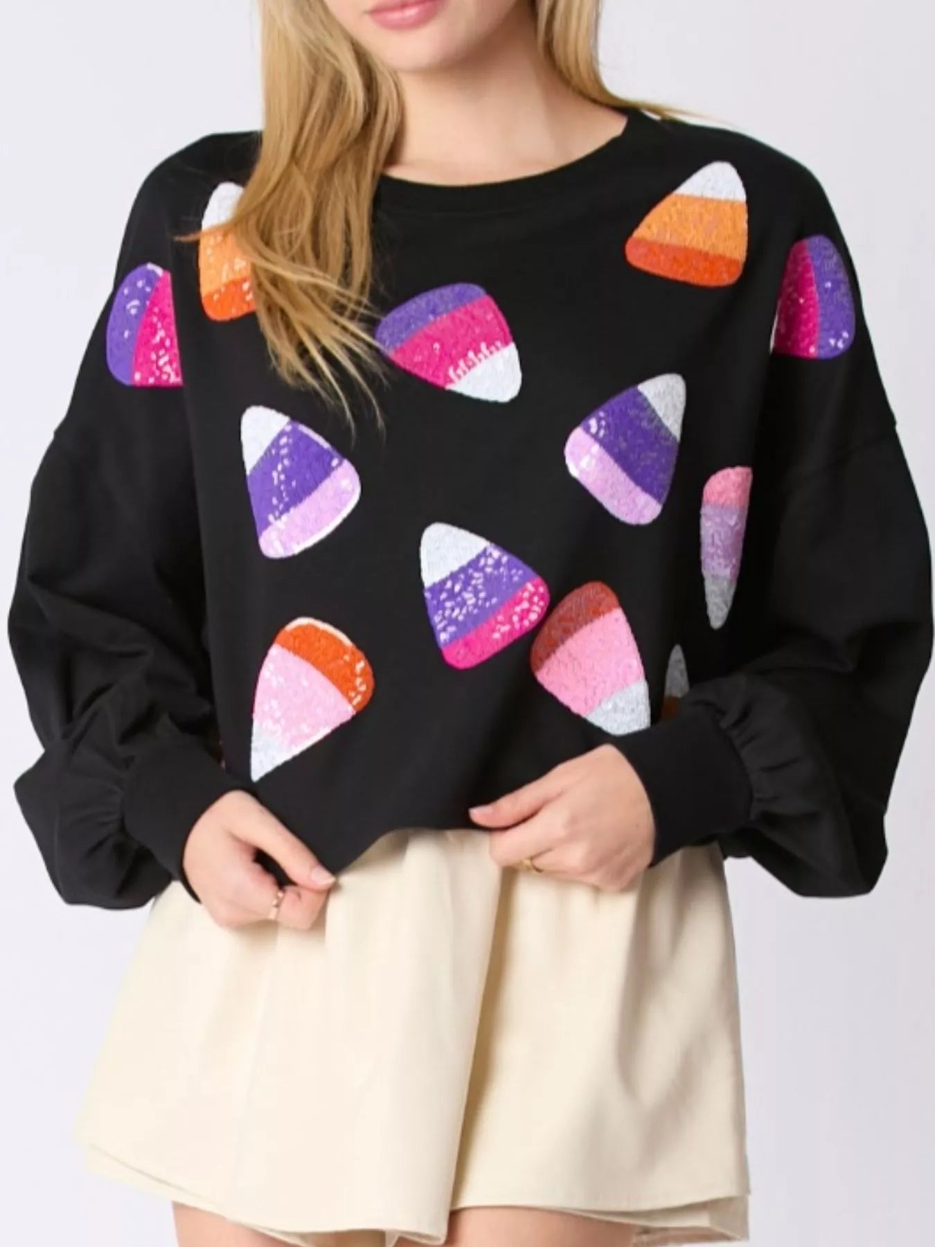Black Candy Corn Sparkle Sweatshirt with sequin candy corn accents, cozy Halloween top.
