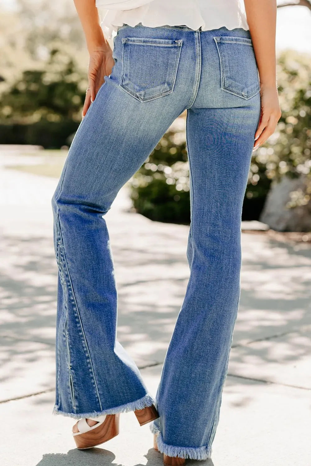 Raw hem flare jeans in washed cotton-blend denim – Canyon Edge style from A Whimsical Affair.