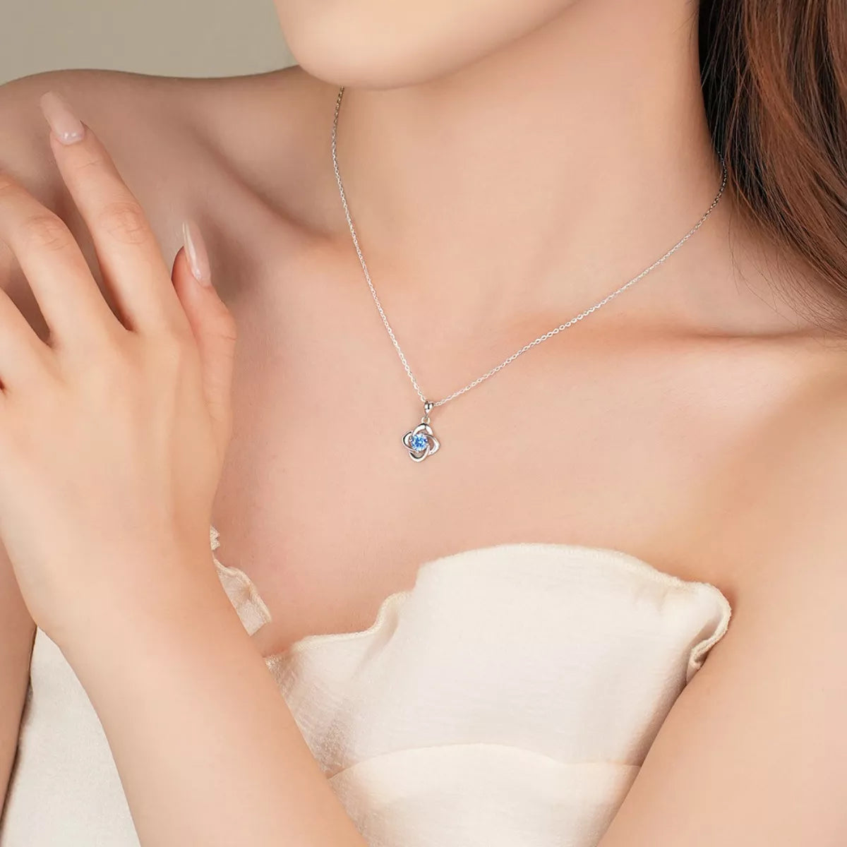 sterling silver celestial orbit pendant necklace with blue zircon stone
