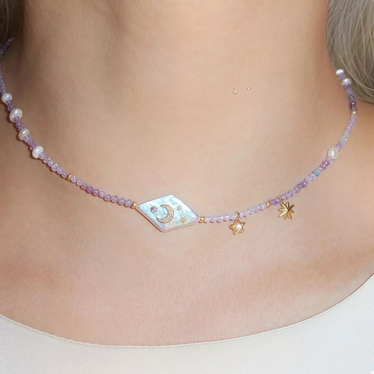 Celestial Harmony Pearl Necklace – freshwater pearl and purple beaded necklace with gold-plated star and moon charms.