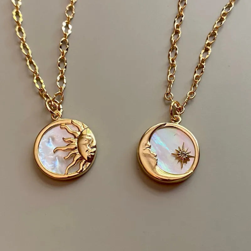 Sun and moon pendant necklace in 18K gold-plated titanium steel with white mother-of-pearl – Celestial Harmony style from A Whimsical Affair.