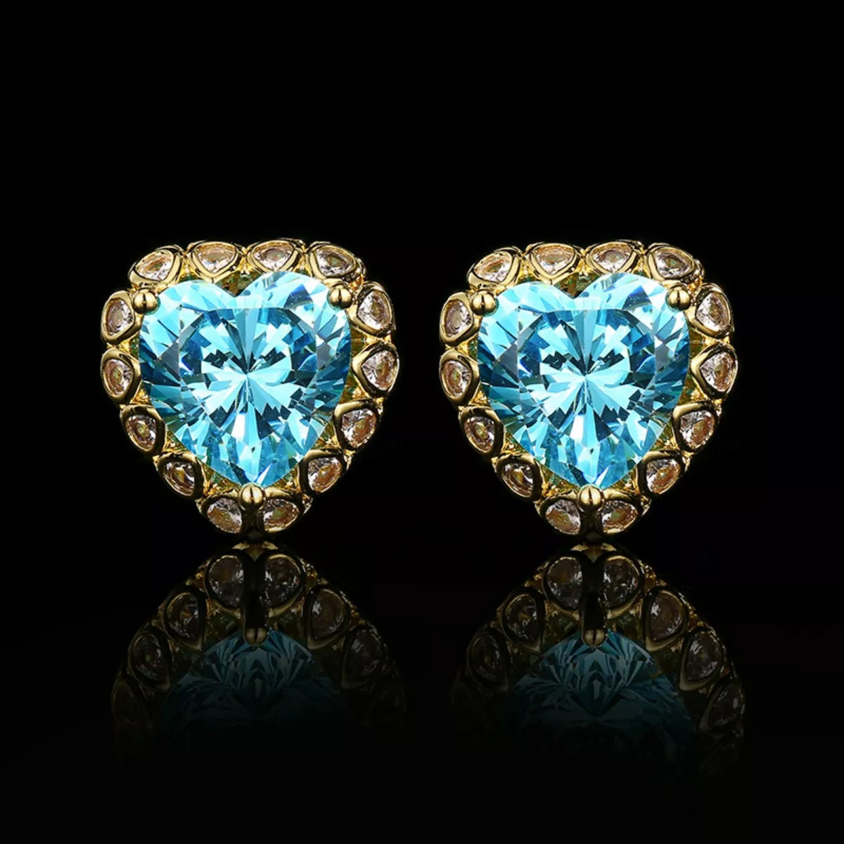 Heart-shaped blue zircon earrings with gold-plated setting and halo stones