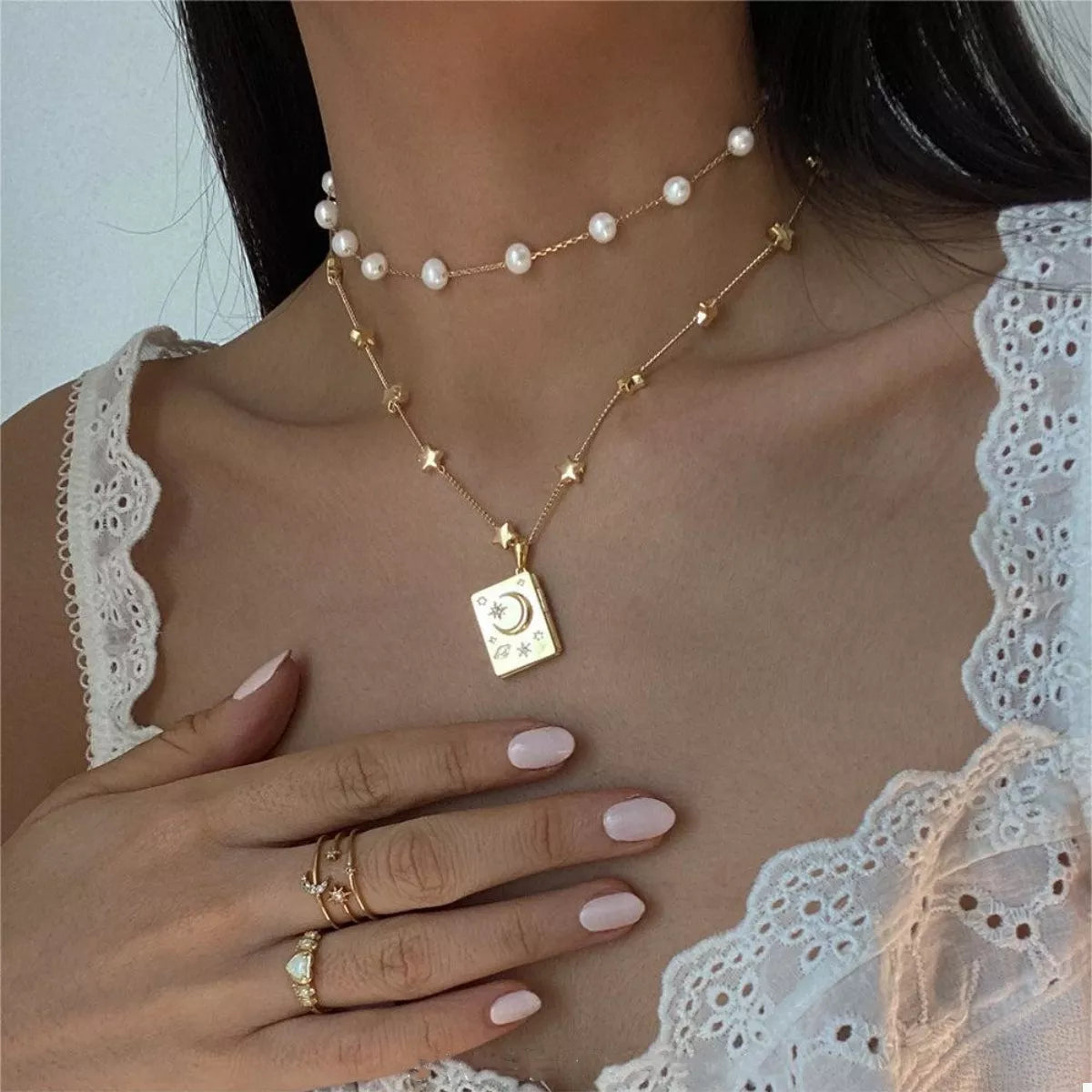 18K gold-plated star and moon locket necklace with zircon details and “You’re My Soulmate” engraving inside.