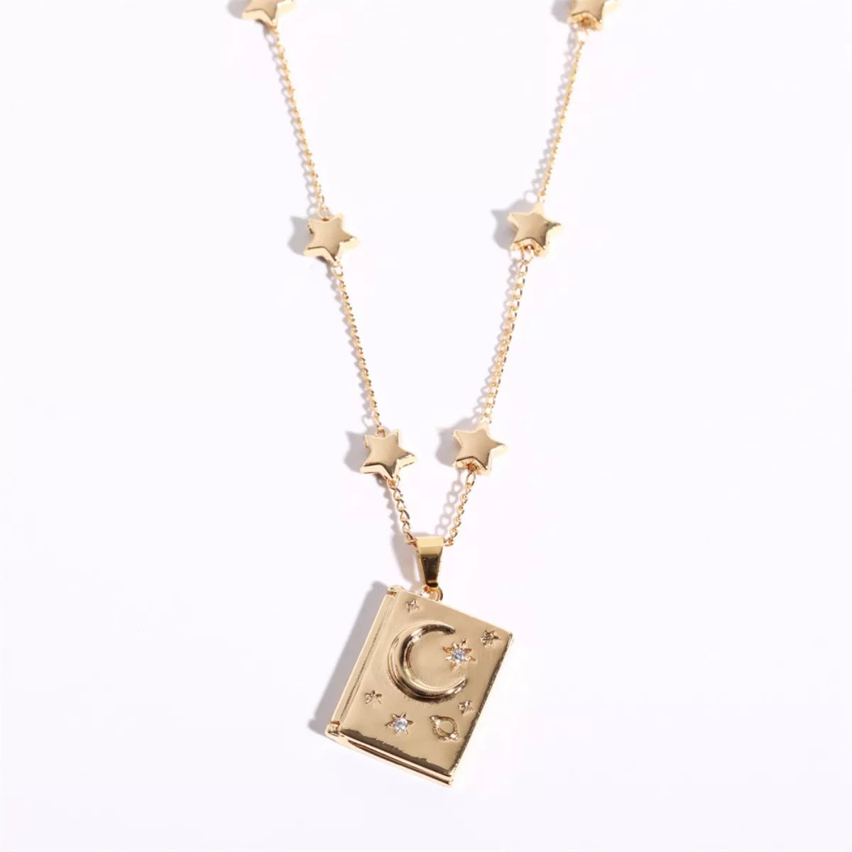 18K gold-plated star and moon locket necklace with zircon details and “You’re My Soulmate” engraving inside.