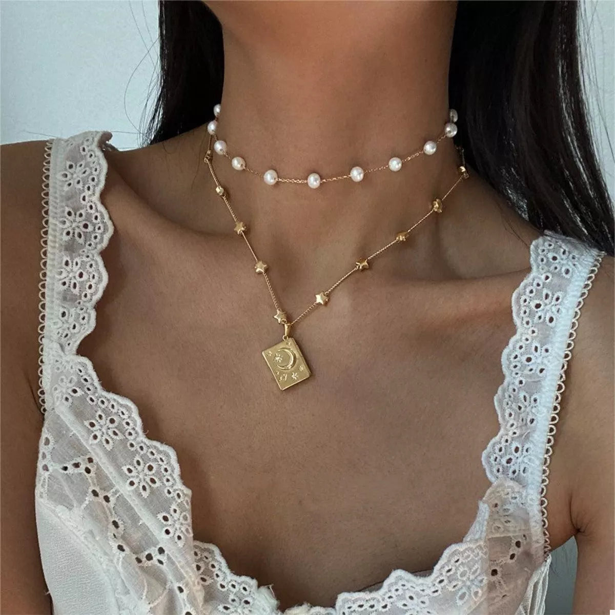 18K gold-plated star and moon locket necklace with zircon details and “You’re My Soulmate” engraving inside.