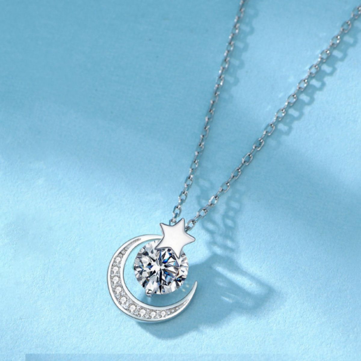 Sterling silver moon and star pendant necklace with zircon center stone