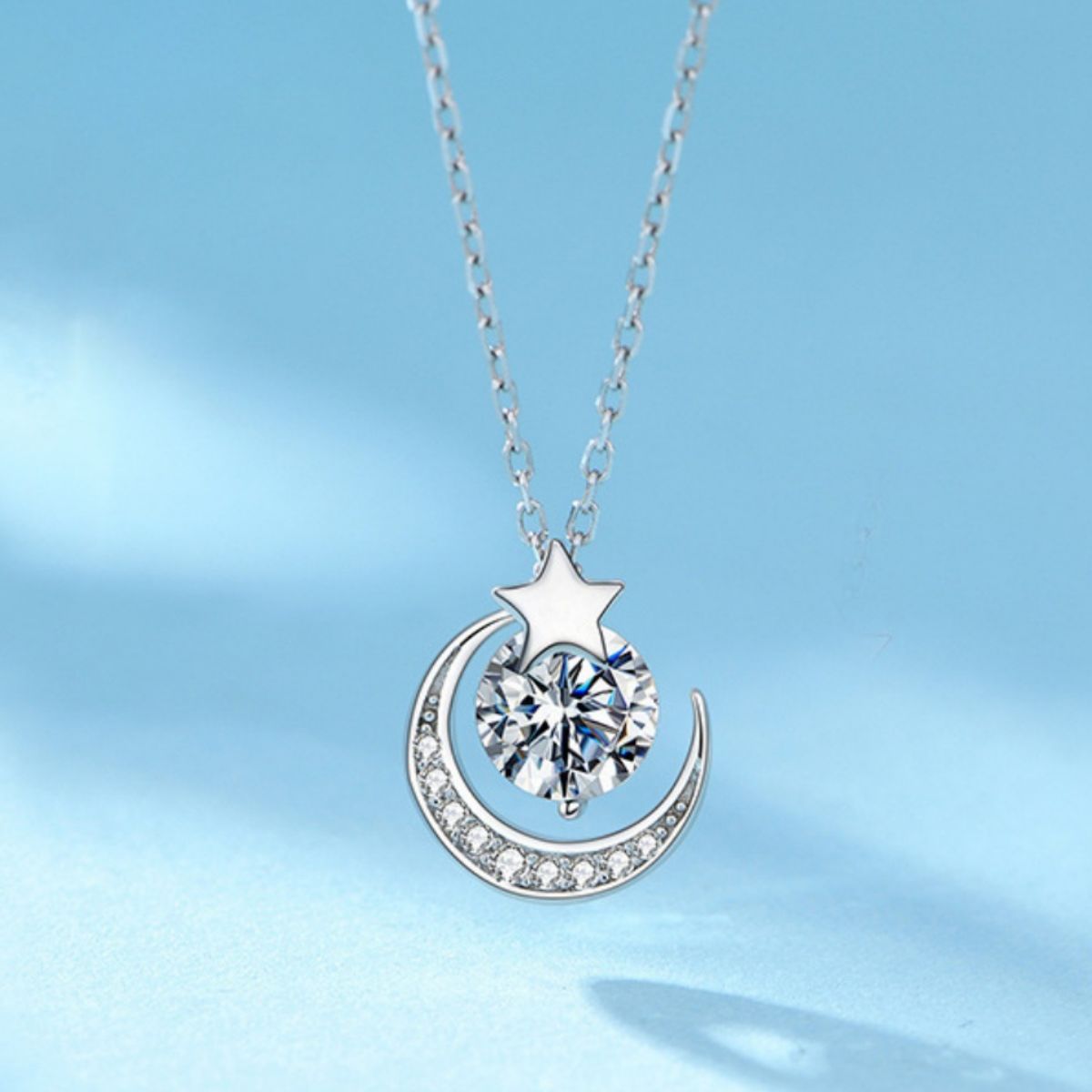 Sterling silver moon and star pendant necklace with zircon center stone