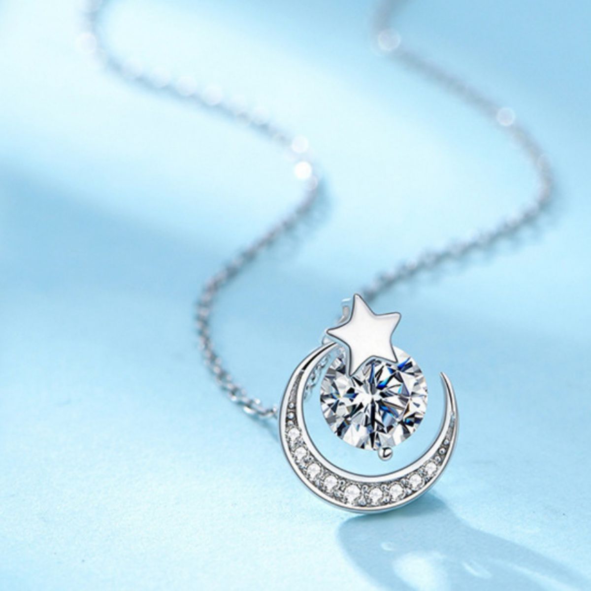 Sterling silver moon and star pendant necklace with zircon center stone