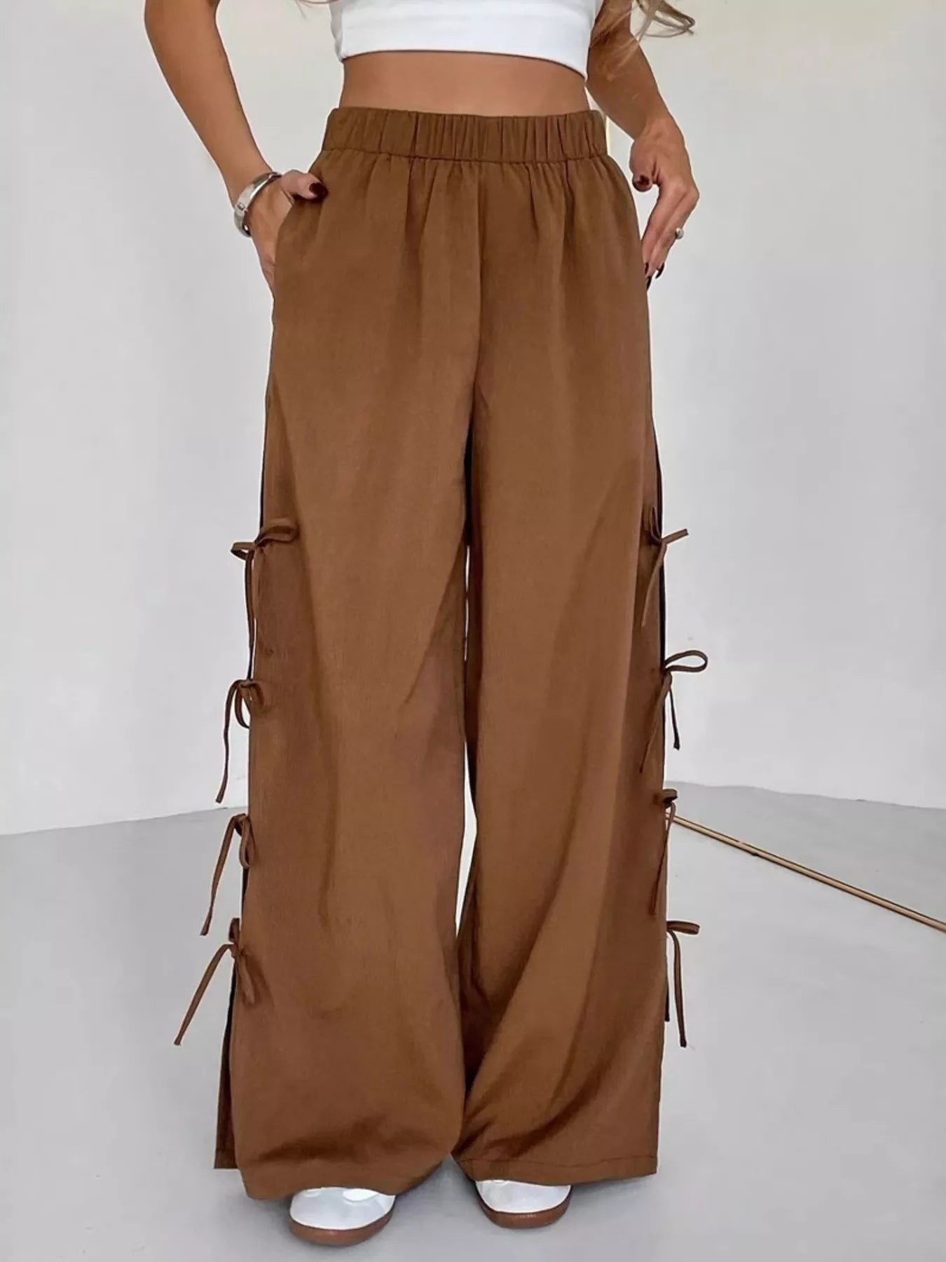 Brown wide leg pants with side tie bow details