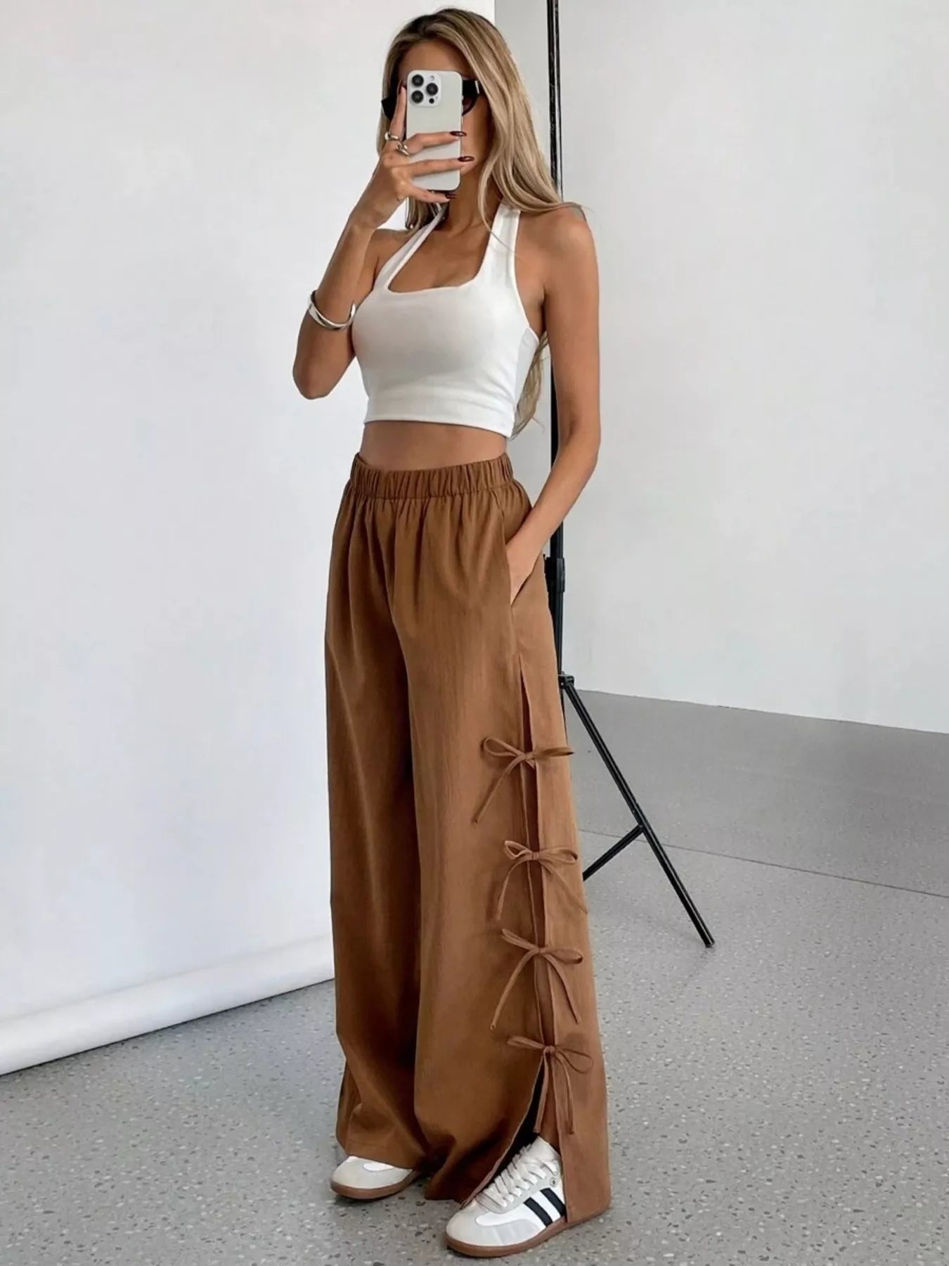 Brown wide leg pants with side tie bow details