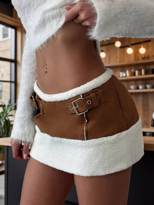 City Edge Color Block Buckle Mini Skirt in brown with exposed seams and buckle detail.