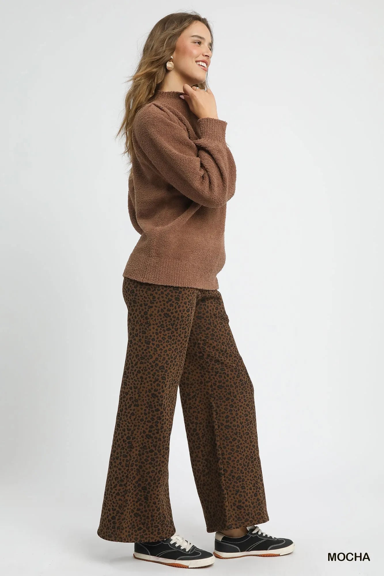 Oversized mocha brown textured sweater with ribbed trim and long sleeves, styled with leopard print pants.