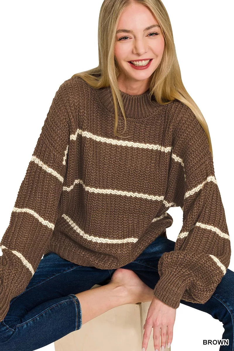 Brown oversized striped sweater with waffle-knit texture, ribbed neckline and cuffs, long sleeves, and cozy relaxed fit.