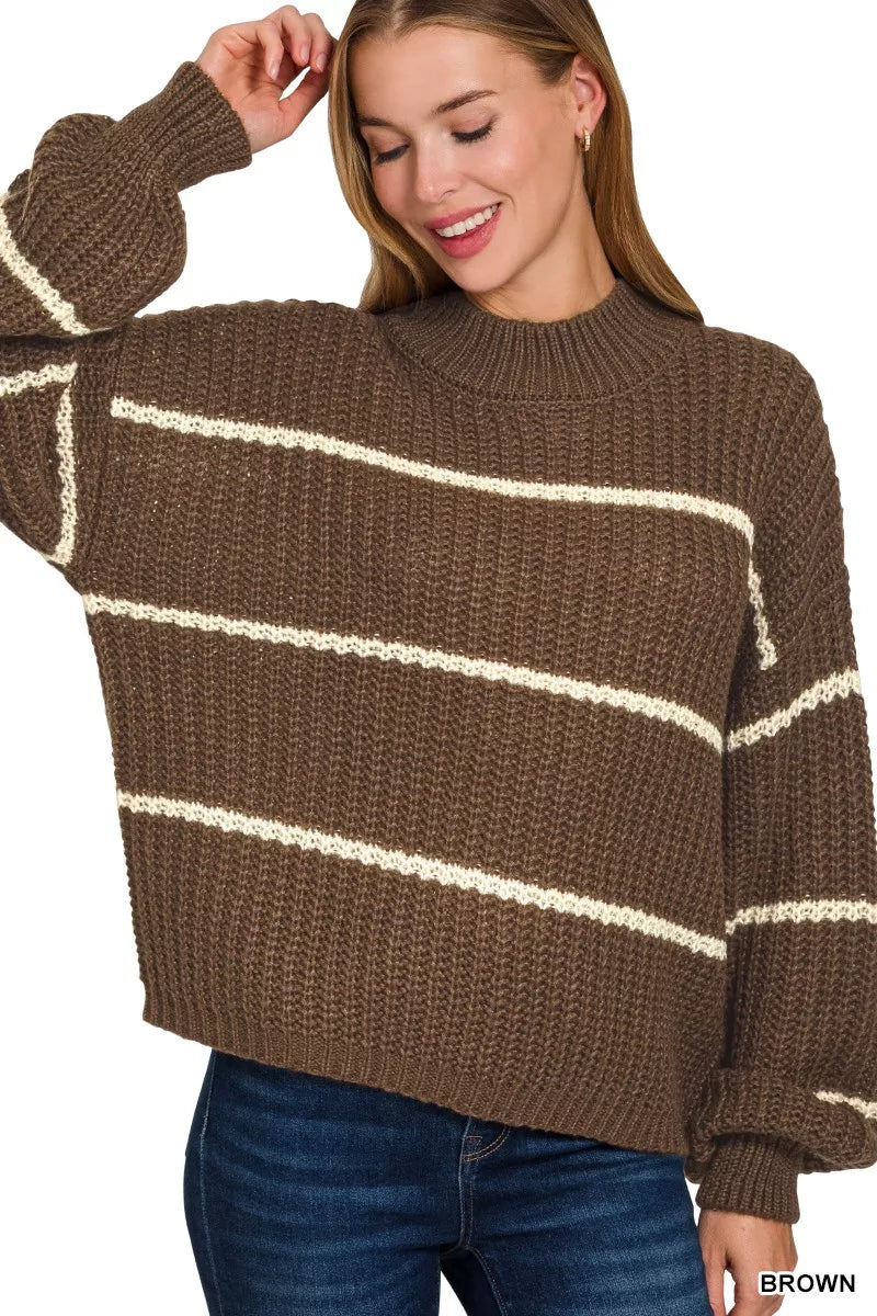 Brown oversized striped sweater with waffle-knit texture, ribbed neckline and cuffs, long sleeves, and cozy relaxed fit.