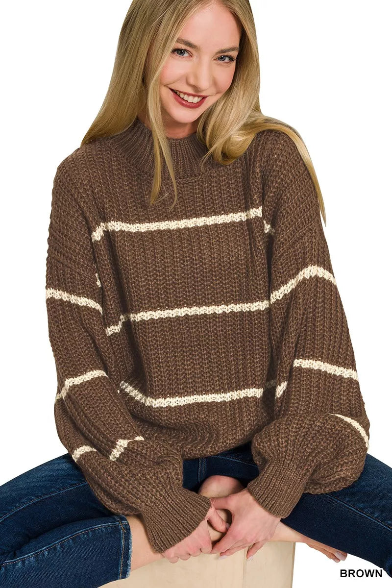 Brown oversized striped sweater with waffle-knit texture, ribbed neckline and cuffs, long sleeves, and cozy relaxed fit.