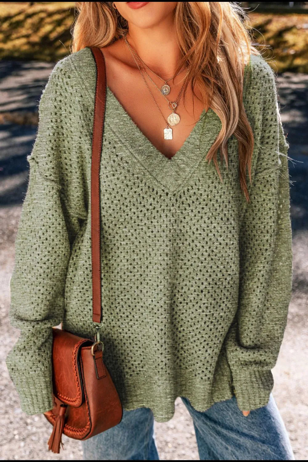 Boutique V-neck textured knit sweater with relaxed fit for fall layering