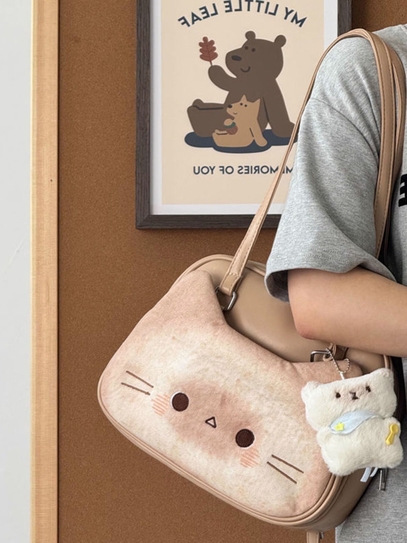 Medium beige shoulder bag with plush cat face and bear charm