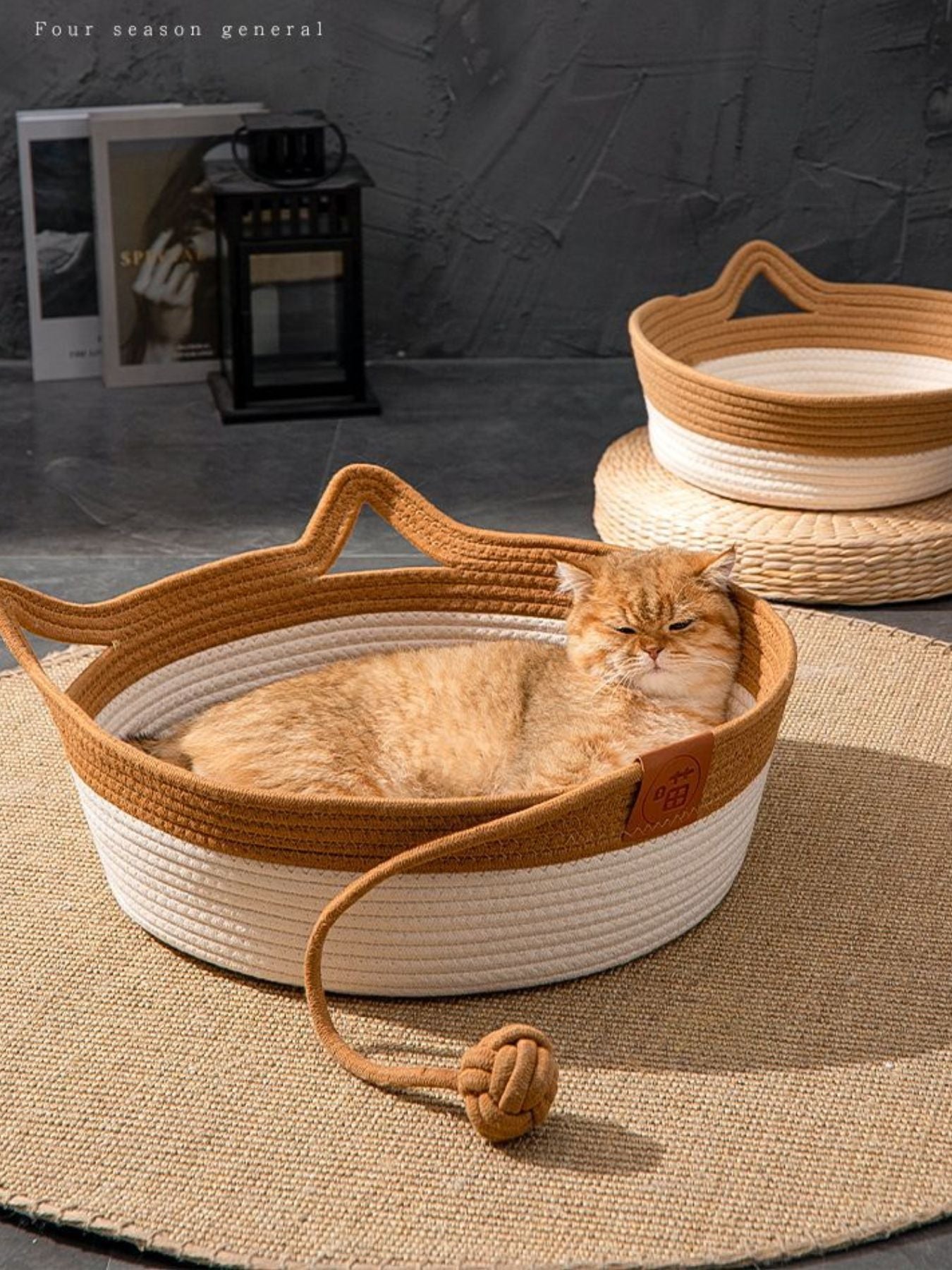 Cat resting inside cat ear shaped cotton pet bed with optional cushion padding