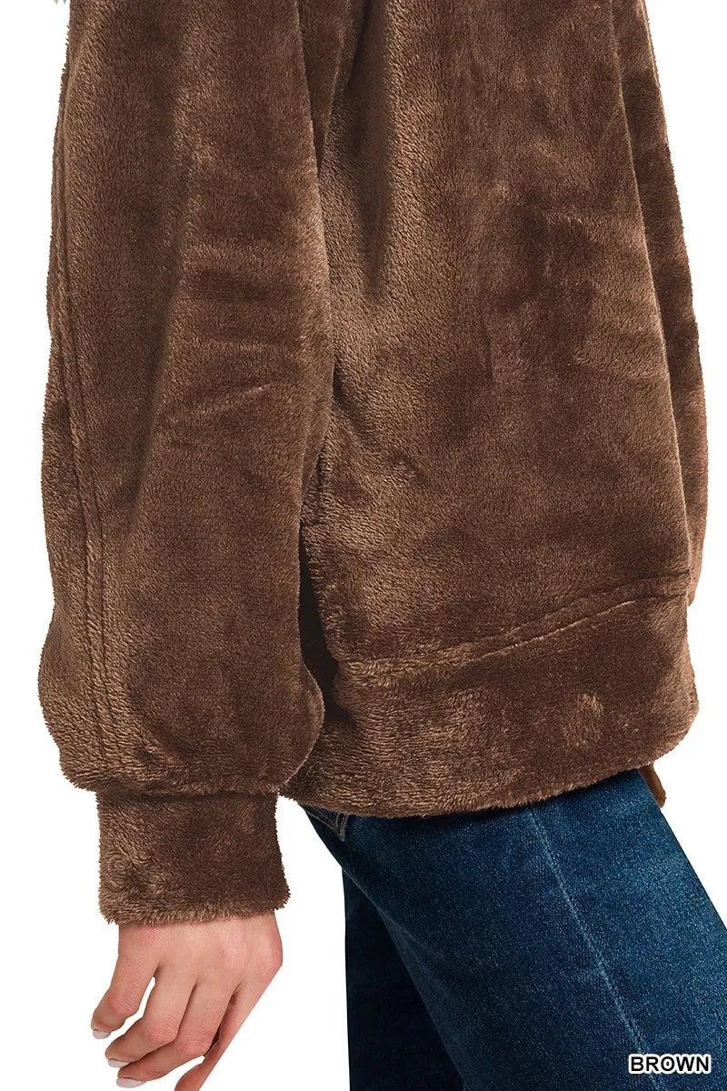 Model wearing brown Zenana Cozy Luxe faux fur half zip pullover with pockets.