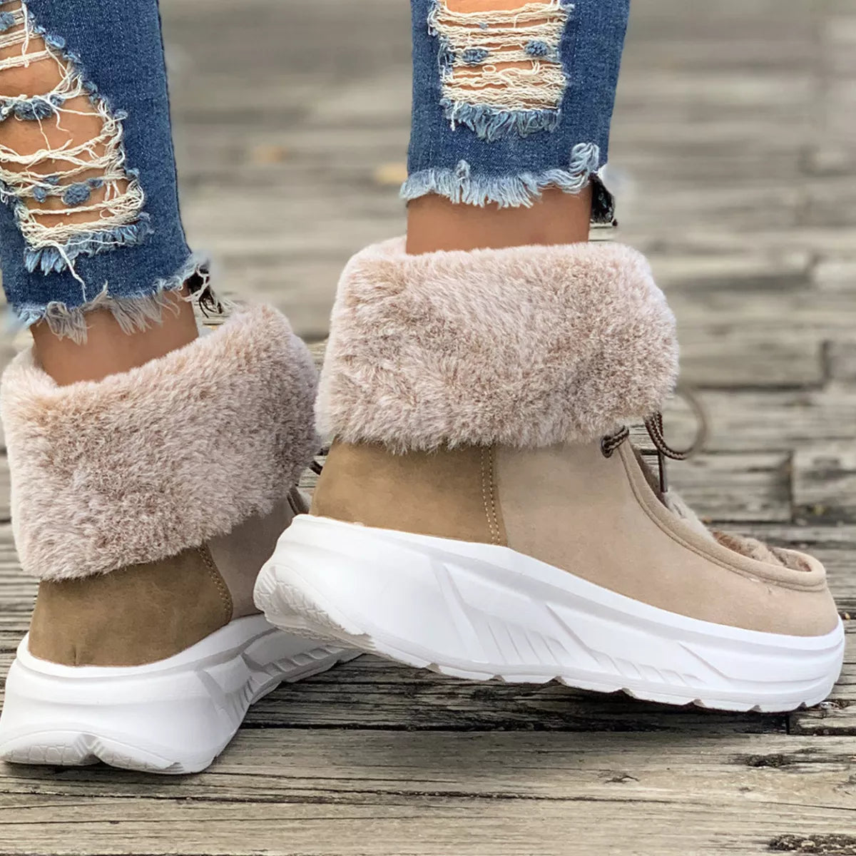 faux fur lace-up ankle boots with suede exterior and cushioned white sole