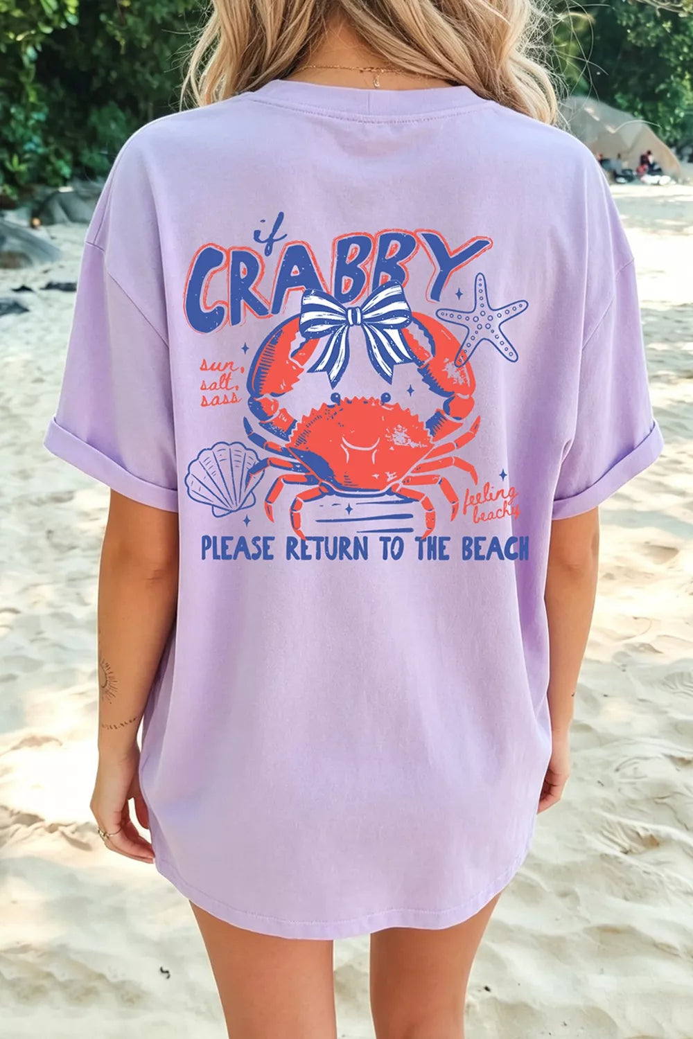 oversized lavender beach graphic t-shirt with retro crab illustration and playful crabby coastal slogan on the back