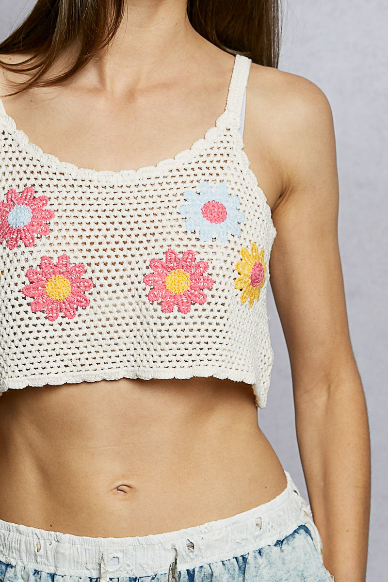 Cream crochet crop top with colorful embroidered flowers