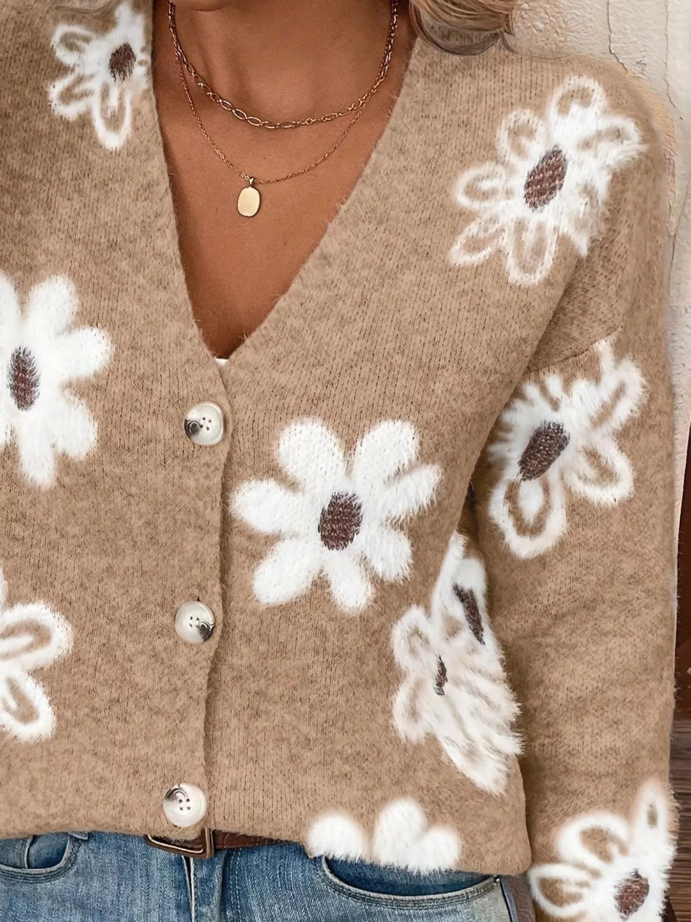 Caramel button-front cardigan with white daisy print styled with jeans