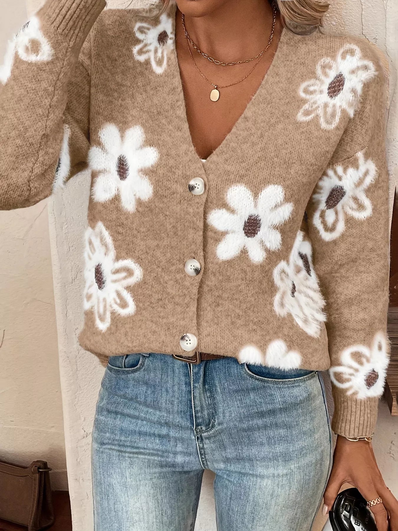 Caramel button-front cardigan with white daisy print styled with jeans