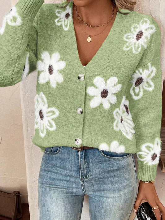Green button-front cardigan with white daisy print styled with jeans