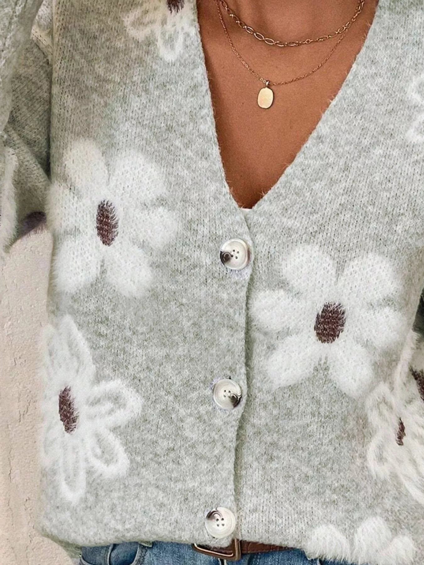 Grey button-front cardigan with white daisy print styled with jeans