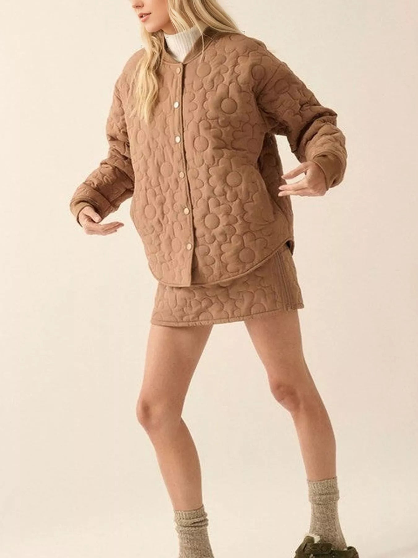 Daisy Dreams Quilted Snap Jacket in brown with daisy quilted floral design and snap closure.