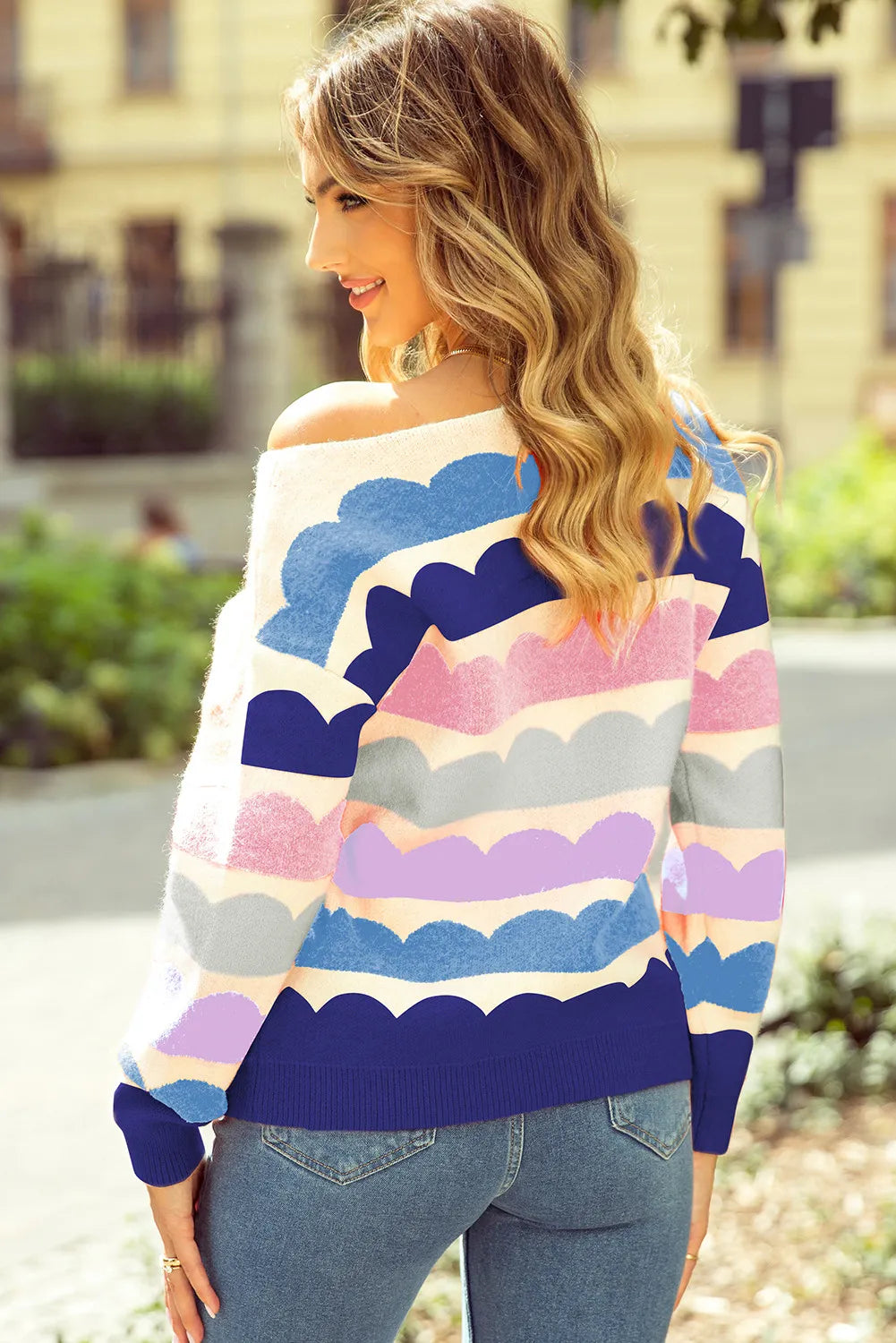 Colorful scalloped stripe boutique knit sweater with ribbed cuffs and relaxed fit