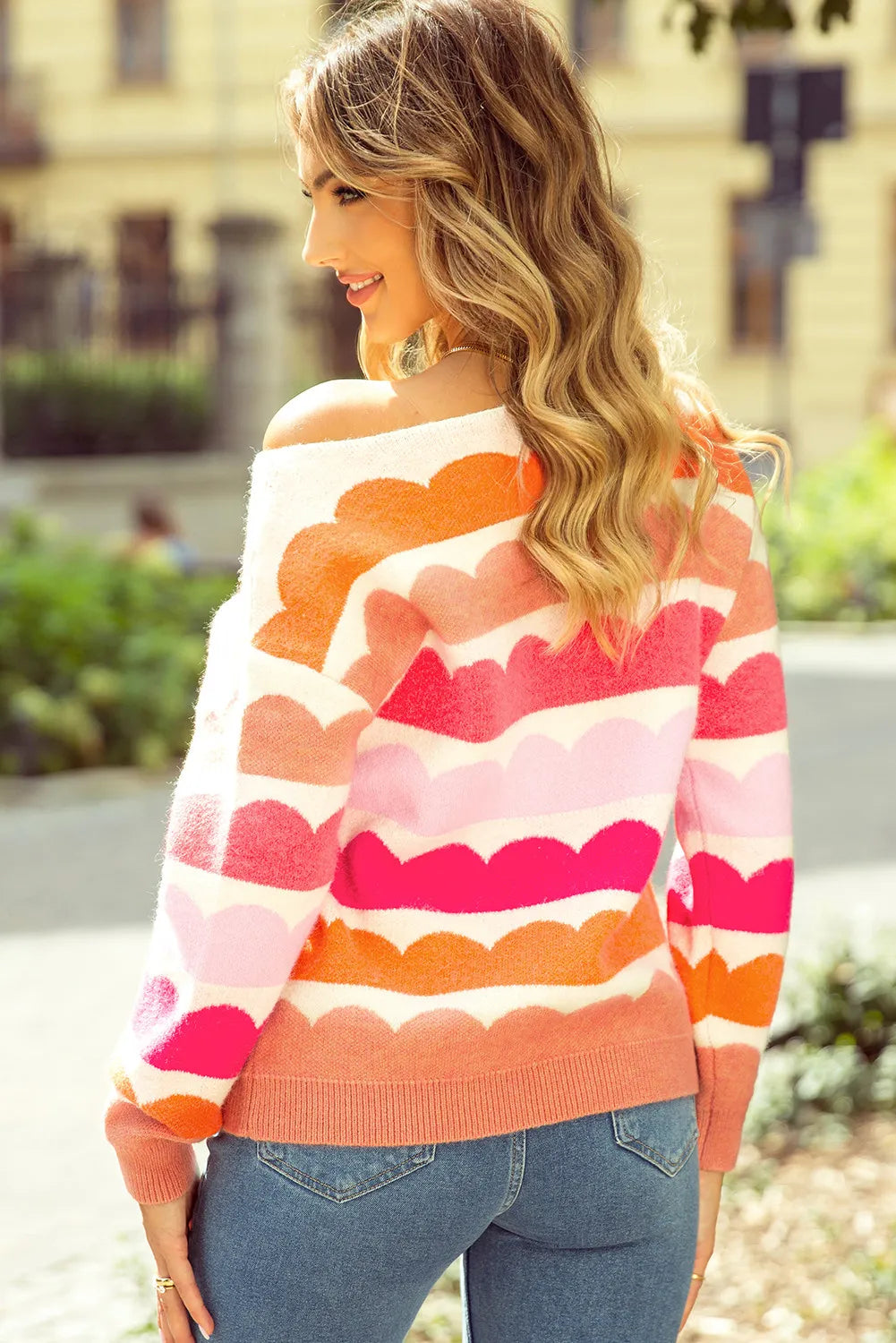 Colorful scalloped stripe boutique knit sweater with ribbed cuffs and relaxed fit