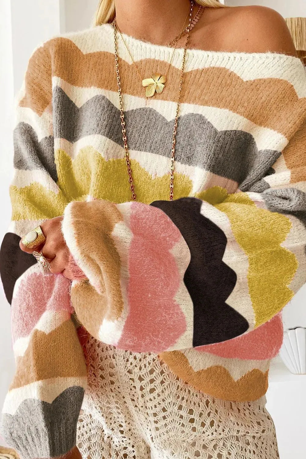 Colorful scalloped stripe boutique knit sweater with ribbed cuffs and relaxed fit