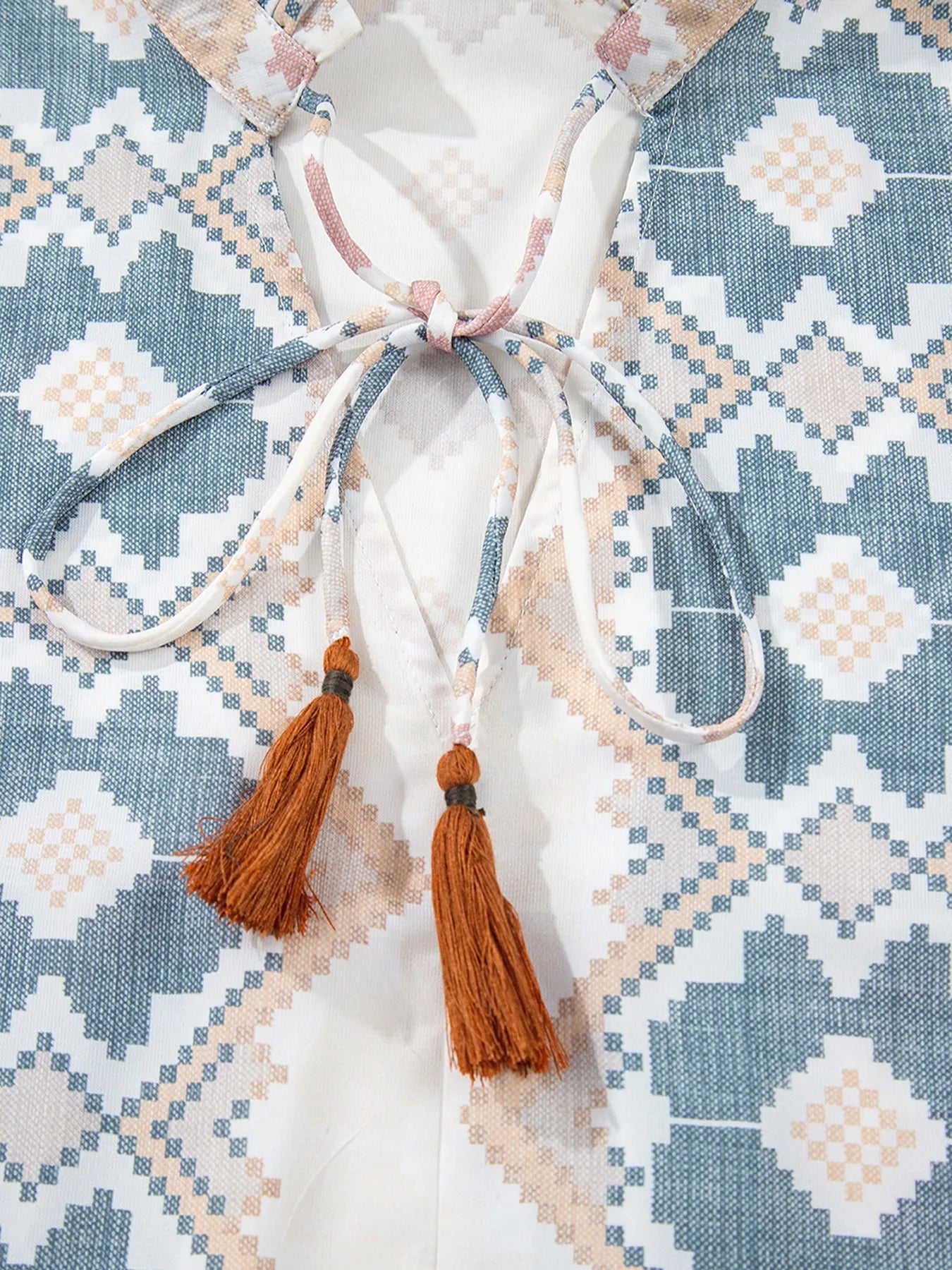 Bohemian geometric print blouse with frilled neckline and tassel tie – Desert Dunes style from A Whimsical Affair.