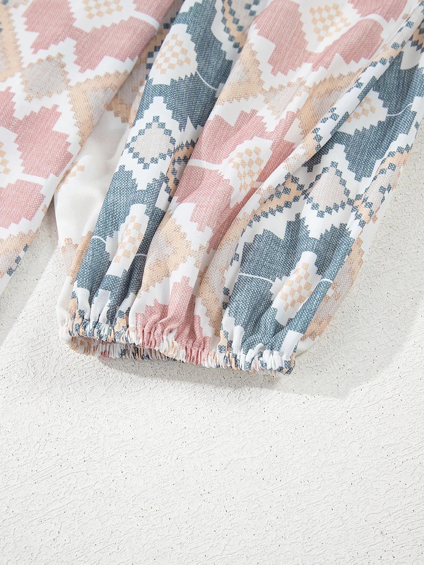Bohemian geometric print blouse with frilled neckline and tassel tie – Desert Dunes style from A Whimsical Affair.