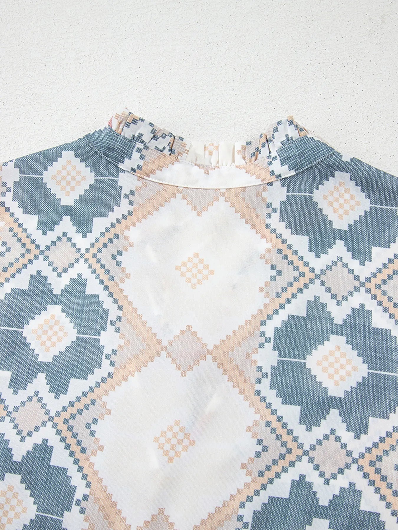 Bohemian geometric print blouse with frilled neckline and tassel tie – Desert Dunes style from A Whimsical Affair.