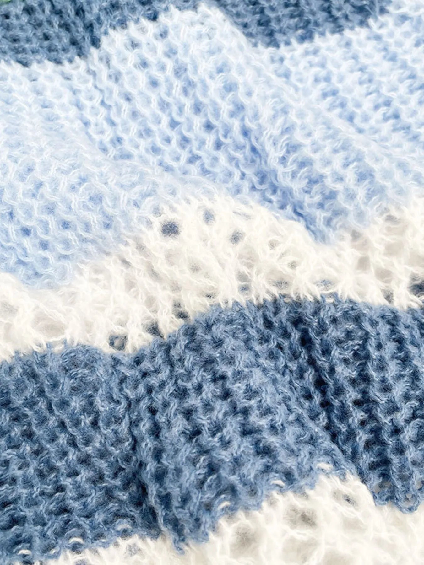 Dusty Horizon Crop Sweater – openwork striped color block knit in dusty blue with flared sleeves.