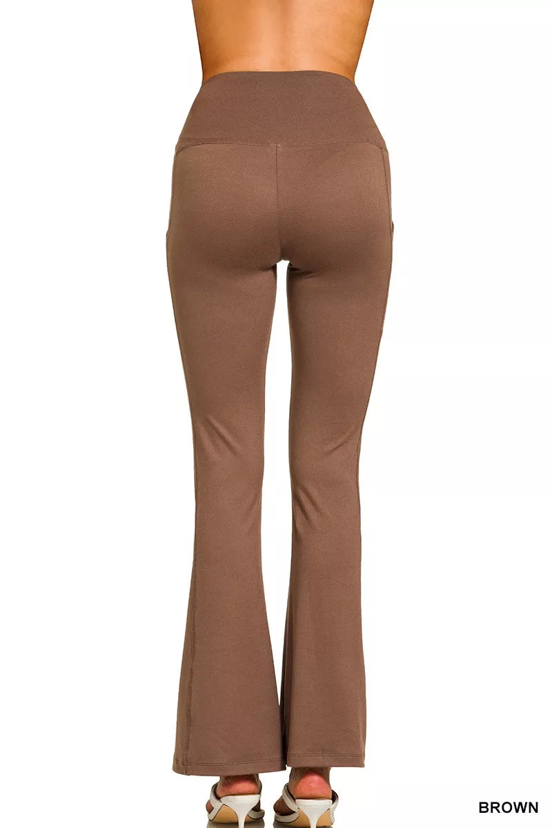 Brown high-rise microfiber flare pants with side pockets shown on model.